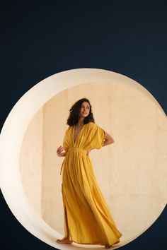 Flowy Yellow Tunic Maxi Dress, Flowy Yellow Maxi Dress For Beachwear, Floor-length Linen Dress For The Beach, Floor-length Linen Dress For Beach, Bohemian Beach Dress In Cotton Gauze, Bohemian Cotton Gauze Beach Dress, Summer Cotton Gauze Dress For Beach Cover-up, Flowy Bohemian Maxi Linen Dress, V-neck Cotton Gauze Beach Dress