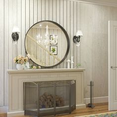 a living room with a fireplace and mirror