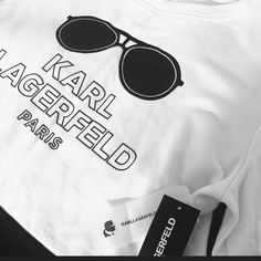 Karl Lagerfeld Sweatshirt With The Iconic Karl Logo In The Front. White Logo Sweatshirt For Spring, Trendy Streetwear Tops With Embroidered Logo, Trendy Streetwear Top With Embroidered Logo, Trendy Embroidered Logo Top For Streetwear, White Logo Tops For Fall, White Logo Top For Fall, White Fall Tops With Logo, Trendy Spring Tops With Embroidered Logo, Trendy White Top With Logo