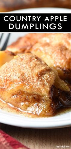 an apple dumpling on a white plate with the words country apple dumplings