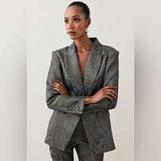 Rendered In Graphic Jacquard, This Is Tailoring With A Fashion-Imbued Twist. Sculpted To The Form With An Hourglass Silhouette, This Bold Blazer Nods To Timeless Design With A Myriad Of Traditional Touches. Notched Lapel Fitted Waist Long Sleeves Single-Breasted Front Flap Pockets Details & Care Main: 90% Polyester, 5% Elastane/Spandex, 5% Metallised Fibre/Metallic Fibre. Lining: 100% Polyester. Dry Clean Only. Model Wears Uk 8/Us 4. Model Height: 5"9. Leg Length Measurement: 76cm. Lace Blazer Jacket, Lace Blazer, Hourglass Silhouette, Jacquard Jacket, Sequin Blazer, Woven Jacket, Corduroy Blazer, Cotton Blazer, Cropped Blazer