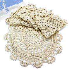 three crocheted doily sitting on top of each other