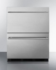 two stainless steel refrigerators sitting next to each other on a counter top with no one in it