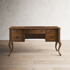 an old wooden desk with two drawers on one side and a drawer on the other