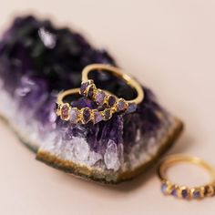 "★ This item is made to order. Please check the shipping section for current processing times. PURPLE OMBRE BIRTHSTONE RING Long associated with royalty, the purple gemstones in this ombre ring will make you feel like a queen the moment you put it on. With raw amethyst, spinel, pink sapphire, and tanzanite stones set in an ombre design, you'll be sure to turn heads. A hand-hammered 14-karat gold plated band adds to the ring's textural feel. * Features amethyst, spinel, pink sapphire, and tanzani Amethyst Ring Band, Ombre Jewelry, Ombre Rings, Purple Gemstones, Raw Amethyst Ring, Raw Amethyst Crystal, Purple Sapphire Ring, Herkimer Diamond Earrings, Purple Stone Rings