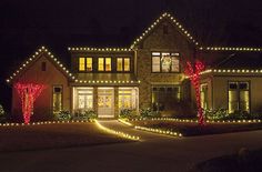 a house with christmas lights on the front