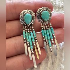 Native American, Zuni Vintage Sterling Silver & Turquoise Concho Dangle Earrings Signed Q.T. The Concho Has A Tear Drop Shape To It Rather Than The Traditional Round. It Is Hand Wrought And Stamped And Has A Turquoise Tear Drop Cabochon With Turquoise Tube Bead, And Sterling Dangles. Beautiful Earrings In Excellent Condition Tube Beads, Tear Drop, Silver Turquoise, Turquoise Sterling Silver, Turquoise Jewelry, Vintage Sterling Silver, Blue And Silver, Beautiful Earrings, Native American