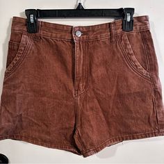 Nwot Rust Colored Size L Denim Shorts. Please See All Photos For Measurements Trendy Jean Shorts With Pockets For Fall, Fall High Waist Jean Shorts With Pockets, High Waist Jean Shorts For Fall With Pockets, High-waisted Jean Shorts For Fall With Pockets, Fall Jean Shorts With Pockets, Fall Season Jean Shorts With Pockets, Casual Brown Denim Bottoms, Jean Shorts With Pockets For Fall, Trendy Brown Denim Bottoms