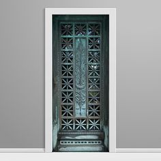 an open door with a decorative design on the front and side panels in green color