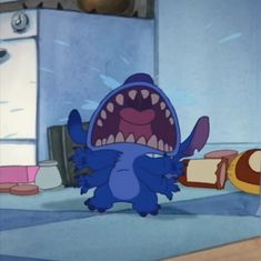 a cartoon character with its mouth open and teeth wide open in front of the camera