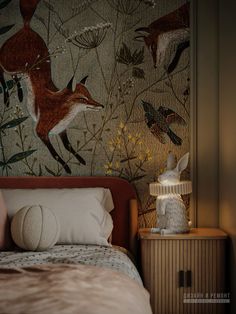 a bed room with a neatly made bed next to a night stand and wallpaper