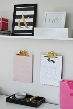 a white desk topped with lots of office supplies