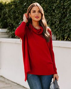 STYLE STEALS ARE NOT DISCOUNT ELIGIBLE AND ARE FINAL SALE Relaxed Fit 52% Viscose. 58% Polyester and 20% Nylon Hand Wash Cold. Dry Flat Cowl Neckline Long Sleeves Side Slits Soft. Knit Fabrication No Closures Not Lined Our The More The Merrier Cowl Neck Knit Sweater will surround you in warmth all season long! This red colored sweater features a high low hemline. Finished with side slits and a cowl neckline. Styled with the Mercury Hoops. Emperor Coin Necklace. Simple Bangle Bracelet. Nashville Red Tops For Fall Layering, Red Tops For Layering In Fall, Red Tops For Winter Layering, Red Stretch Sweater For Layering, Red Knit Top For Layering, The More The Merrier, Simple Bangle, Style Steal, Ribbed Mini Dress