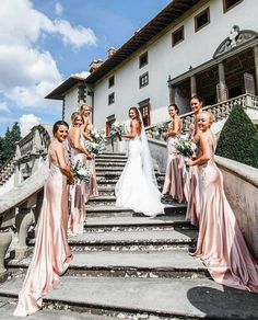 a group of women standing on top of steps