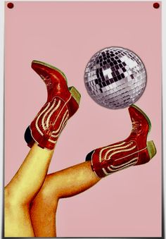 a woman's legs with red boots and disco ball in her hand on pink background