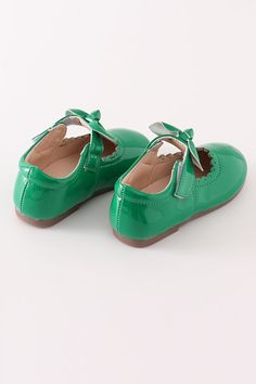 Step out in style with the playful and quirky Green Bow Mary Jane Shoes. These shoes feature a bold green bow that adds a pop of color to any outfit. Perfect for adding a touch of fun to your everyday look. So go ahead, slip into these unique and stylish shoes and make a statement! 100% polyurethane S00035 Chic Green Heels With Bow, Green Bow Heels, Green Mary Janes, Mary Jane Shoes Sage Green, Green Non-slip Sandals For Play, Sequin Crafts, Plaid And Leopard, Green Bows, Swimwear Girls