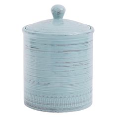 a light blue ceramic jar with a wooden lid