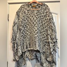 Nwot. Pol Brand Knitted Poncho. Size Large. Shades Of Gray And White. Heavy Weight. Super Nice. **Note This Is A Heavy Weight Sweater. I Cannot Do A Large Bundle With This. Poshmark Has A 10 Pound Weight Limit On Labels. Bundle To Save White One Size Acrylic Sweater, White Knit Poncho For Fall, White Acrylic Sweater, White Cozy Winter Poncho, White Oversized Winter Poncho, Oversized White Poncho For Winter, Oversized White Poncho For Fall, White Knitted One-size Poncho, Oversized Knit Winter Poncho