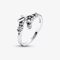 Find magic in every moment with Pandora's Disney Tinker Bell Sparkling Ring. Hand-finished in sterling silver and sparkling cubic zirconia, Tinker Bell is primed for adventure atop a scene of stars and pixie dust. "I can fly" is engraved in the inside of the band as an empowering reminder to always believe in your dreams. Sterling Silver & Cubic Zirconia Believe In Your Dreams, Pandora Disney, Ring Hand, Sparkling Rings, Always Believe, Jewelry Fashion Trends, Tinker Bell, Pixie Dust, Tiffany & Co.