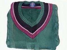 Vintage 80 90s GAP Oversized Green Sweater v-neck preppy tennis Varsity cable knit college collegiate 1989 Graduation Normcore Dark Academia This vintage Gap sweater is the perfect addition to any wardrobe. The hunter green color and cable-knit pattern give it a retro feel, while the oversized and relaxed fit make it a comfortable choice for any occasion. The V-neckline adds a touch of style, and the heavy weight and breathable material make it suitable for any season. This unisex sweater is great for travel, parties, casual wear, workwear, and business settings. The sweater is machine washable and made of 100% cotton, ensuring easy care and durability. Casual V-neck Sweater For School, Sporty Winter School Sweater, Oversized Collegiate Cotton Sweater, Green Oversized Retro Sweater, Green Vintage College Sweatshirt, Vintage Green Crew Sweater, Retro Green V-neck Sweater, Green Oversized Sweater, College Sweater