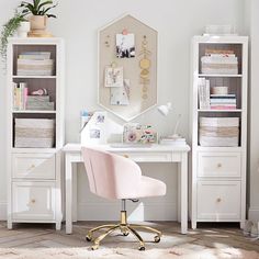 a white desk and chair in a room