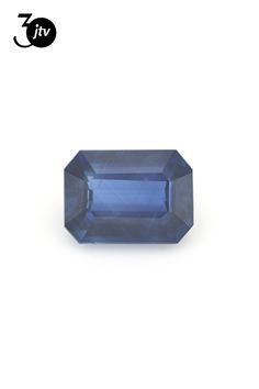 a blue sapphire stone on a white background