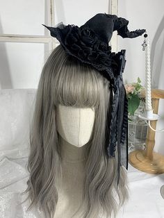 Complete your gothic Halloween look with our cross charm gothic black floral design witch hat. This stylish hat features intricate floral patterns, rhinestoned bowknot detailing, and a striking cross charm, adding a touch of mystique to your outfit. Made for the fashion-forward witch, this hat is the perfect accessory for any Halloween gathering or costume party. Stand out from the crowd and embrace your dark side with this bewitching accessory.   Please note that this product includes the hat o Black Gothic Hat For Costume, Black Fitted Witchy Hat, Black Gothic Hat For Cosplay, Fitted Black Witchy Hat, Gothic High Crown Halloween Hat, Black High Crown Hat For Halloween, Gothic Hat For Halloween And Alternative Fashion, Gothic Hat For Halloween, Gothic Black Mini Hats For Halloween