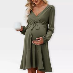 Celebrate your pregnancy in style with our Women's Maternity Dress, designed to provide comfort and elegance for expecting mothers. This stunning V-neck long sleeve dress features a flattering tie waist that beautifully accentuates your growing bump, allowing you to feel confident and chic during every stage of your pregnancy. Crafted from a soft and breathable blend of 95% polyester and 5% spandex, this midweight dress drapes effortlessly, creating a flowy silhouette that is perfect for any occ Flowy Long Sleeve Maternity Dress For Spring, Midsize Maternity Fashion, Casual Green Maternity Dress, Green Long Sleeve Maternity Dress, Flowy Fall Dresses, Flowy Dress Photography, Fall Maternity Dress, Cute Maternity Clothes, Nursing-friendly Green Maternity Dress