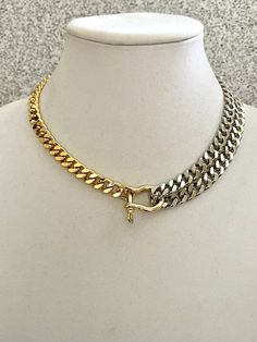 Two-tone Miami Cuban Chain Necklace is a high quality gold-plated brass chain. The double strand on the one side makes this a very stylish and edgy piece of jewelry. 2 Options available 1. Gold double chain necklace with one silver strand joined with silver screw shackle 2. Silver double chain necklace with one gold strand joined with gold screw shackle Great weight and sits beautifully around the neck. The chain is approximately 9mm wide . The shackle is approximately - 21mm x 25mm This is a very special piece and a perfect gift for a friend, girlfriend, wife or even just for yourself:) Tips to keep your jewelry looking good. 1) Keep jewelry away from water and chemicals. 2) Remove during physical activities. 3) Store separately in a soft pouch or airtight box. 4) Avoid wearing to bed. 5) Dc Style, Silver Strand, Cuban Chain Necklace, Double Chain Necklace, Bohemian Jewellery, Friend Girlfriend, Chunky Chain Necklaces, Miami Cuban, Jewelry Picture