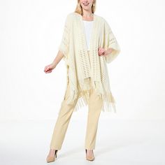 Antthony Fringe Sweater Topper  Made from a soft acrylic sweater knit yarn, Antthony's stunning ruana wrap provides seasonless beauty and lightweight warmth for day or evening. The open crochet detail gives it a unique boho style that complements everything from jeans to dress pants to dresses. Spring Beige Knit Poncho, Beige Knit Poncho For Spring, Spring Open Knit Acrylic Cardigan, Elegant Spring Acrylic Sweater, Spring Acrylic Yarn Knitted Cardigan, One Size Shawl Wrap For Spring, One Size Spring Shawl Wrap, One Size Knit Shawl Cardigan, Beige Poncho For Spring Layering