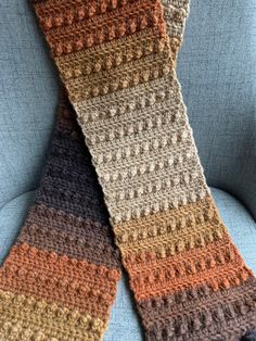 Harvest scarf is a beautiful ombré of brown, orange, beige it's a perfect fall accessory that will take you right into the colder months. Winter is coming stay warm and cozy with this textured puff stitch. Makes an excellent gift for the holidays! Winter accessories are my favorite 😍 Boho Wallet, Puff Stitch, Fall Scarves, Fall Accessories, Winter Is Coming, Brown Orange, Winter Accessories, Stay Warm, Warm And Cozy