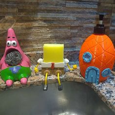 two spongebob soap dispensers sitting next to each other on a counter