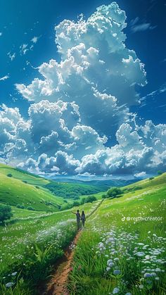 two people walking down a dirt road in the middle of a green field under a cloudy sky