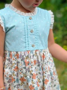 Cotton Dresses With Buttons For Garden Party, Cotton Dress With Buttons For Garden Party, Cute Daywear Dresses With Buttons, Polka Dot Dress With Lace Trim For Spring, Cute Lace Daywear Dress, Cute Lace Dress For Daywear, Cute Swiss Dot Cotton Dress, Cute Cotton Swiss Dot Dresses, Jade Dress