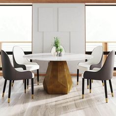 a white table with four chairs around it