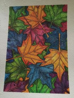 an image of colorful leaves painted on paper with colored pencils and watercolor paints