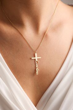 "Cross Name necklace is one of our favorite design for Baptism. Also perfect for daily use. It can become your Great option as Baptism gifts or Christian gift for Christening. Lets personalize with any name your stylish necklace. Gold Name Necklaces & Cross Name necklaces most dainty minimalist design in the world.  💖Personalized piece for your self or for someone special in your life.. 🎁Great Dainty necklace as Mothers Day Gifts, Christian Gifts, Gift for Baptism, Christmas Gift, birthday gift, gifts for mom or any special occasion. 💖Personalize a timeless, dainty and chic personalized jewelry for yourself now.  ✋All our personalized necklaces %100 custom made by hand with Love and Care in our workshop! Nickel Free High Quality Materials *How to customize your cross necklace? Leave a n Personalized White Cross Necklace, Personalized Gold Cross Necklace For First Communion, Personalized Sterling Silver Necklace For Baptism, Personalized Cross Pendant Necklace For Baptism, Personalized Cross Necklace Pendant As Gift, Personalized Cross Pendant Necklaces For Gifts, Personalized Cross Necklace For Baptism, Personalized Cross Pendant Necklace For Gift, Personalized Baptism Cross Necklace