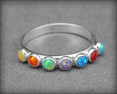 Multi Opal Ring - (choose # of opals) | LE Jewelry Designs Spiritual Sterling Silver Opal Ring, Spiritual Adjustable Sterling Silver Birthstone Ring, Spiritual Sterling Silver Birthstone Ring, Rainbow Sterling Silver Round Jewelry, Rainbow Sterling Silver Rings As Gift, Rainbow Round Sterling Silver Jewelry, Multicolor Opal Round Ring, Rainbow Colored Round Sterling Silver Jewelry, Opal Gemstone Stackable Rings Gift