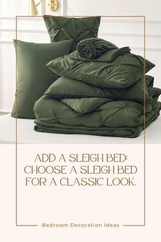 a bed with green sheets and pillows on it