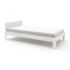 a white bed frame with no sheets on it, against a white background that appears to be empty