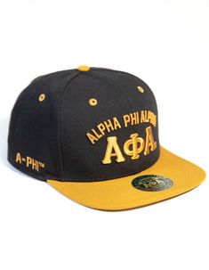 a black and yellow hat with the words, alpha phipa on it's side