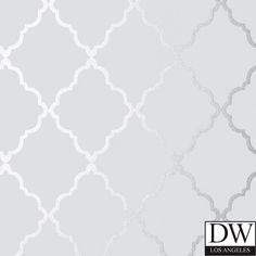 a gray and white wallpaper with an intricate design