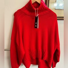 Adidas Ivy Park Cropped Oversized Turtleneck Sweater Red Pink Stripe Size: Large Retail $75 Limited Edition Valentines Exclusive. The Long Sleeves And Soft Fabric Made Of 72% Rayon And 28% Polyester Provide Ultimate Comfort During Cold Seasons. The Sweater Is Machine Washable For Easy Care. The Product Line Is Ivy Park, And There Are No Graphic Prints Or Vintage Styles. It Is Perfect For Fans Of Troye Sivan, Beyonce, And Ivy. Oversized Red Top For Layering, Red Oversized Chic Tops, Oversized Red Sweater For Layering, Ivy Park Adidas, Beyonce Ivy Park, Oversized Red Ribbed Sweater, Beyonce Ivy Park Icy, Ivy Park Clothing, Red Turtleneck Sweater