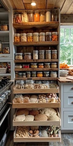 an organized kitchen with lots of food in it