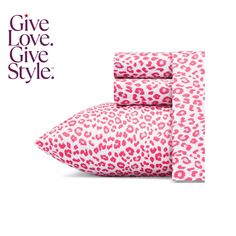 a pink and white leopard print sheet set with the words give love, give style