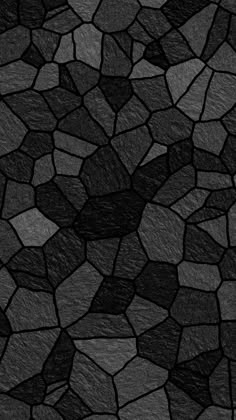 an abstract black and white background with small rocks