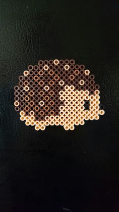 a piece of art made out of perler beads