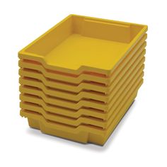 a stack of yellow plastic containers sitting on top of each other in front of a white background