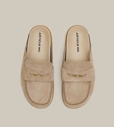 Casual Slides With Suede Lining And Round Toe, Casual Slip-on Slippers With Suede Lining, Casual Beige Slippers With Leather Footbed, Casual Slippers With Suede Lining, Casual Beige Mules With Leather Footbed, Casual Beige Slides With Leather Sole, Beige Slip-on Mules With Suede Lining, Casual Slip-on Clogs With Suede Lining, Casual Beige Mules With Rubber Sole