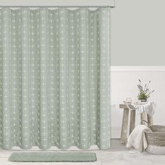 a bathroom scene with focus on the shower curtain